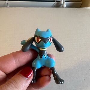 Blue and Black Action Figure